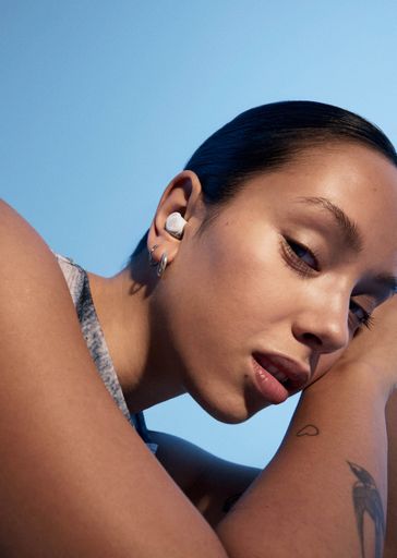 Urbanista Porto Cloud White sleep-friendly wireless earbud lifestyle